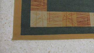 2 tappeti rettangolari verdi e gialli