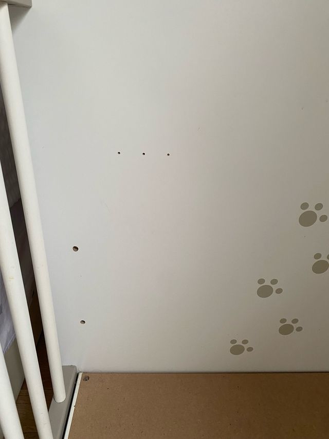 Cuna infantil con diseño de gatitos