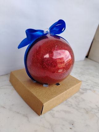 Pallina di Natale trasparente con fiocco blu