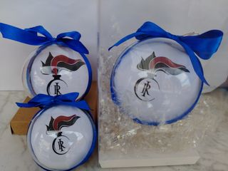 Pallina di Natale trasparente con fiocco blu