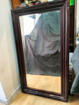 Espejo grande de madera y cristal