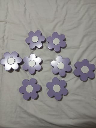 Tirador de flor morado y blanco