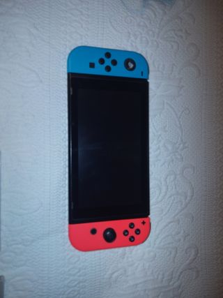 Nintendo Switch con juegos y mando extra