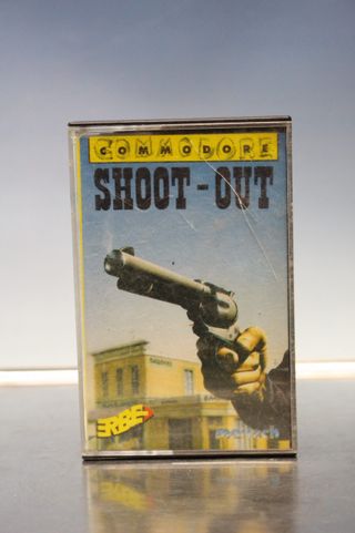 Commodore. Juego Shoot - Out. Erbe, 1988. Cinta, cassette.
