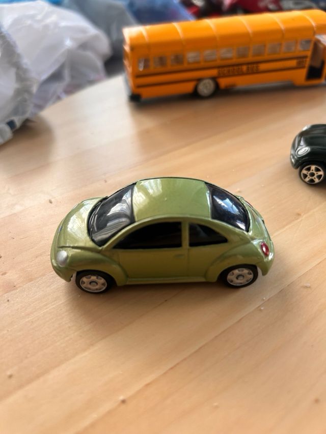 coches y moto de juguete antiguos