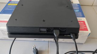 PS4 Slim Negra con FIFA 21