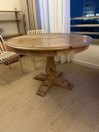 Mesa de comedor redonda de madera