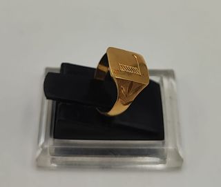 Sello niño "L" de oro 18k, 1,98gr. Ref. G-065.