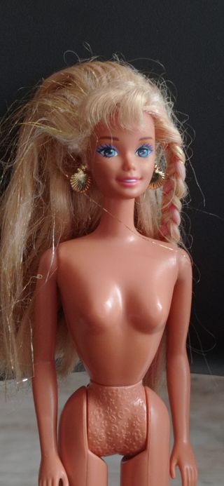 Barbie con orecchini a conchiglia