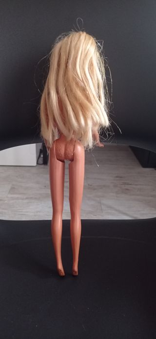 Barbie con orecchini a conchiglia