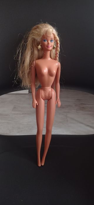 Barbie con orecchini a conchiglia