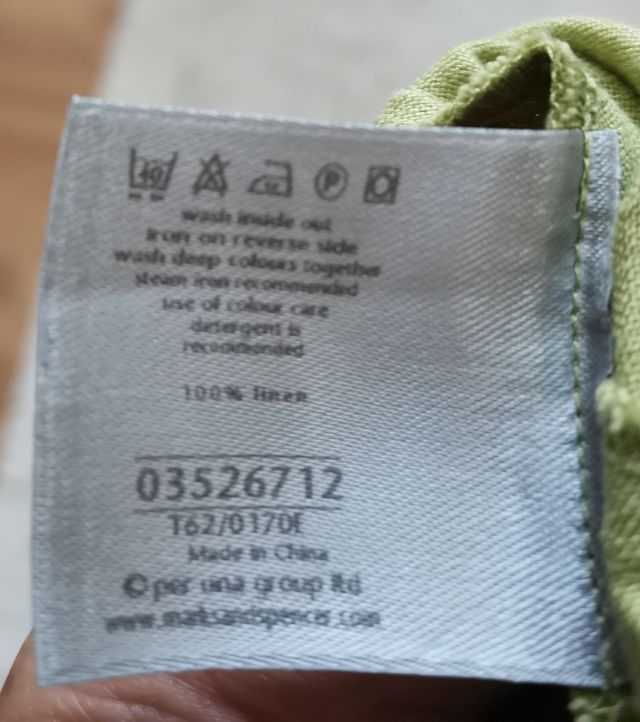 Abito verde con spalline floreali ricamate