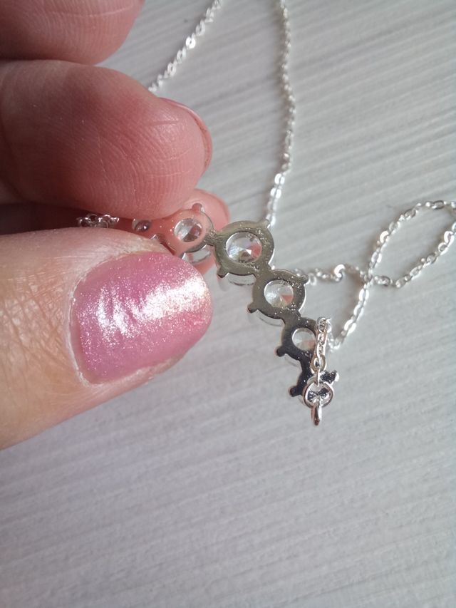 Collana 7 zirconi argento + 2 orecchini punti luce