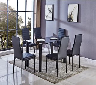 Mesa más 6 sillas negras