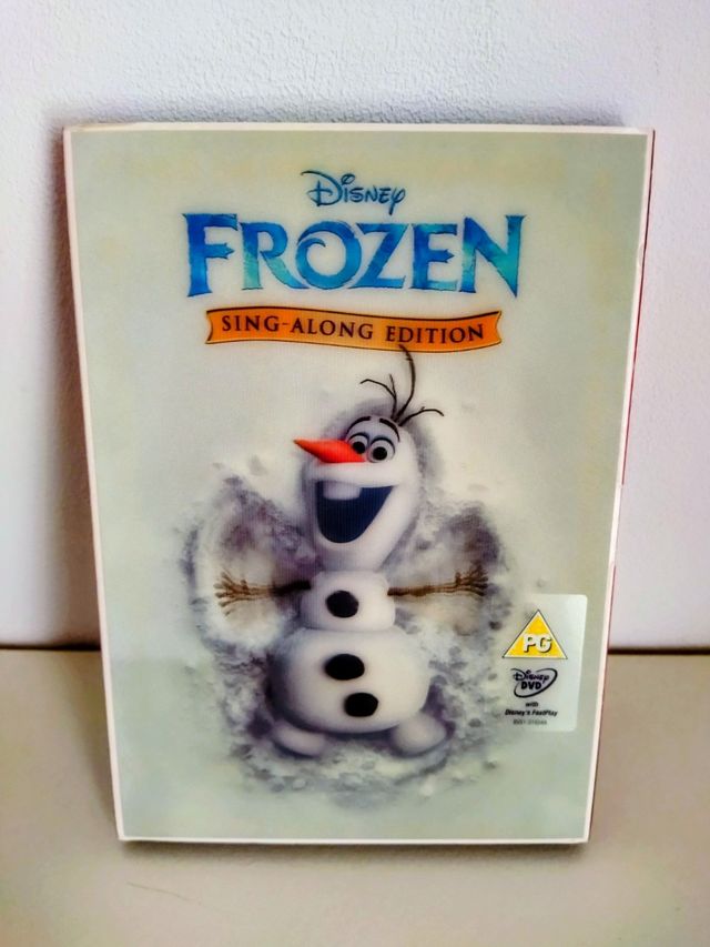 DVD Frozen Sing Along + muñecas Elsa y Ana