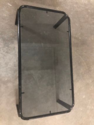 Mesa de centro de cristal y metal