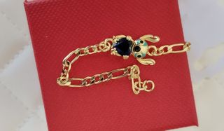 Pulsera de oro laminado 14k con figura de Stich 