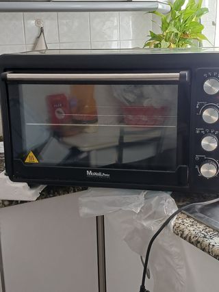 Horno portatil de Convección Maxell Power 60L .
