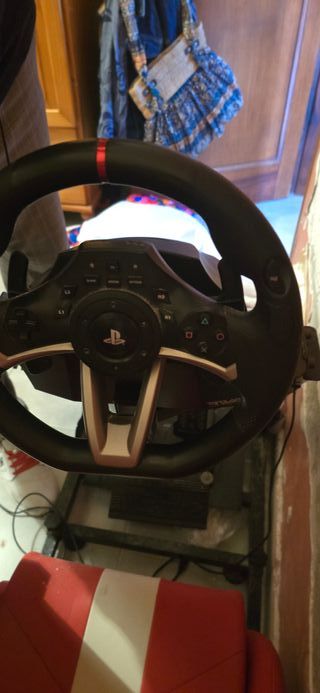 Sillón de juego con volante y pedales