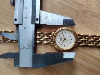 Reloj Racer Dorado y Blanco