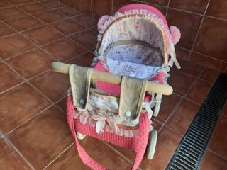 Carrito de muñecas rosa