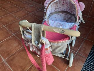 Carrito de muñecas rosa