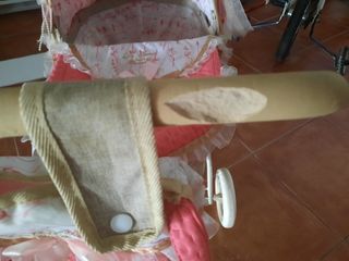 Carrito de muñecas rosa