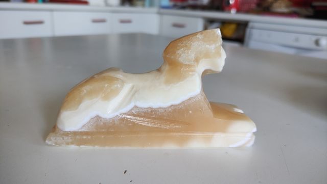 Esfinge de piedra vintage pálida