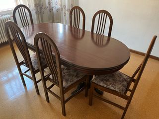Mesa de comedor ovalada con 6 sillas