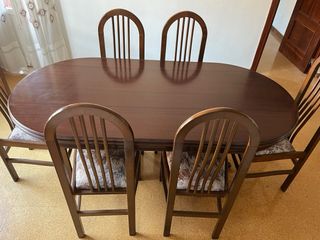 Mesa de comedor ovalada con 6 sillas