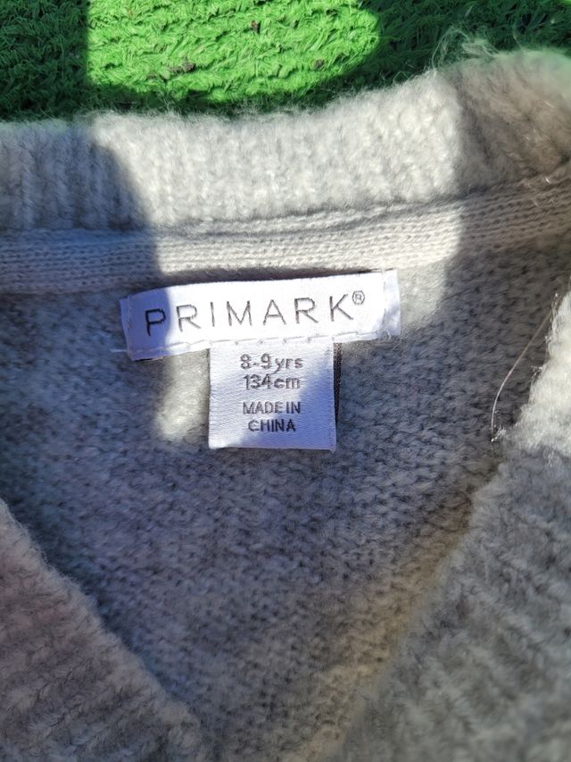 Jersey niña pompones gris 8-9 años