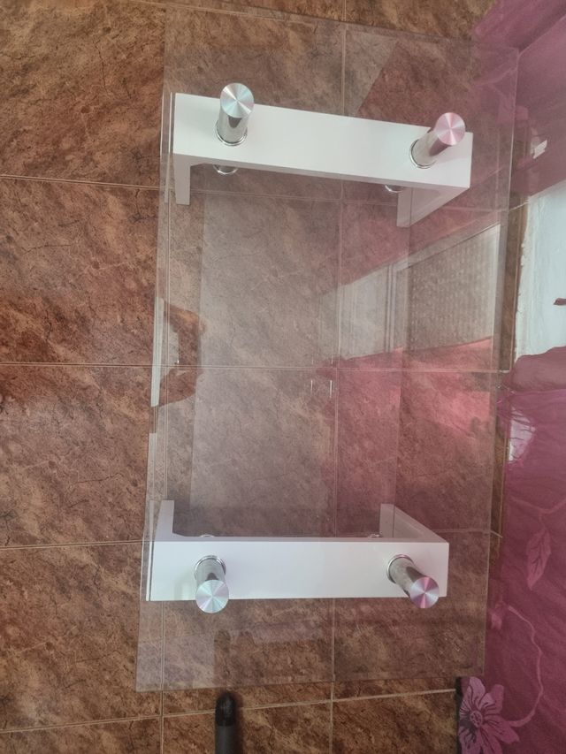 Mesa de centro de cristal y metal