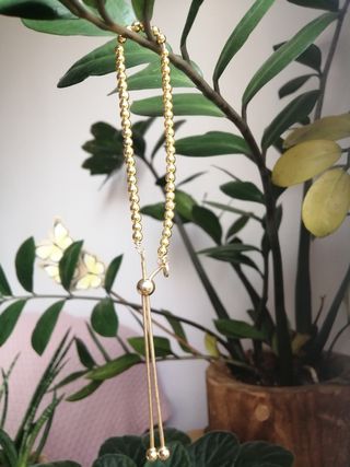 Pulsera bañada en oro con cierre ajustable