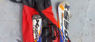 Esquís Rossignol X-Fight con bastones y botas