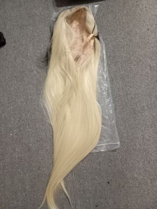 Peluca rubia nueva