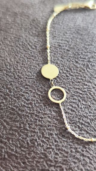 Pulsera de oro con círculos y bolitas chica nueva.