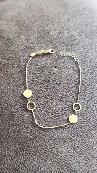 Pulsera de oro con círculos y bolitas chica nueva.