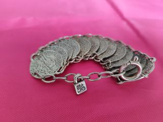 Pulsera  monedas Uno de 50 