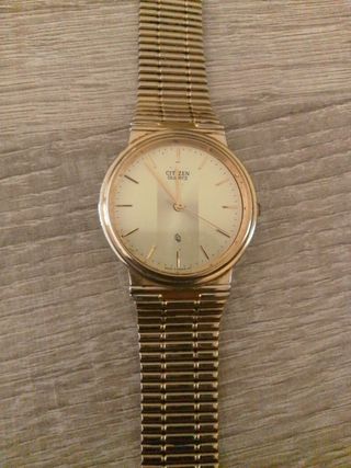 Reloj Citizen Quartz Dorado y Blanco