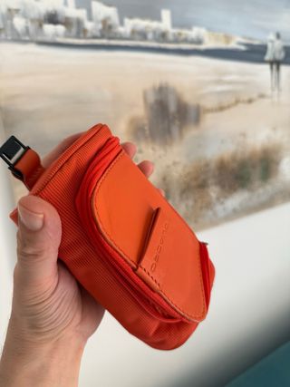 Trousse Piquadro arancione con portachiavi