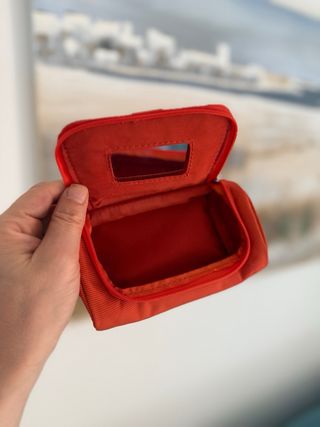 Trousse Piquadro arancione con portachiavi