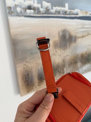 Trousse Piquadro arancione con portachiavi