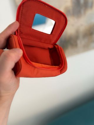 Trousse Piquadro arancione con portachiavi