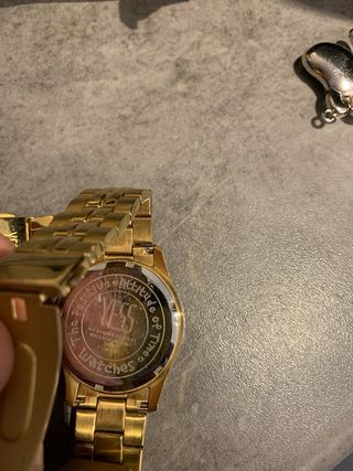 Reloj YES Dorado y Blanco vendo el par