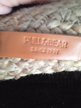 Bolso redondo de rafia