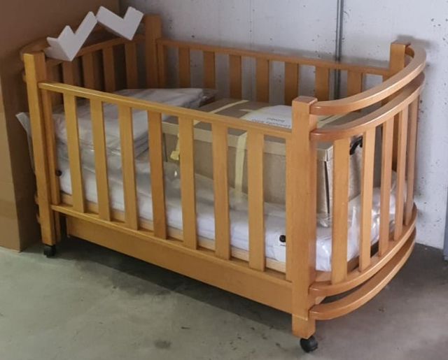 Lettino Foppa Pedretti in legno usato