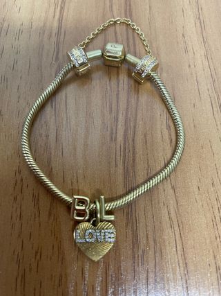 Pulsera Pandora Dorada con Dijes