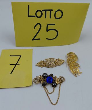 Tre spille bigiotteria dorate