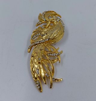 Tre spille bigiotteria dorate