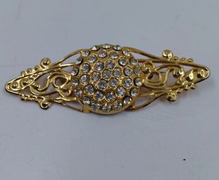 Tre spille bigiotteria dorate